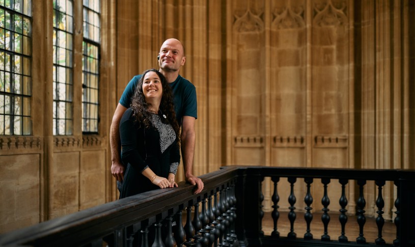 Couple in Divinity School in bottom left corner on stage